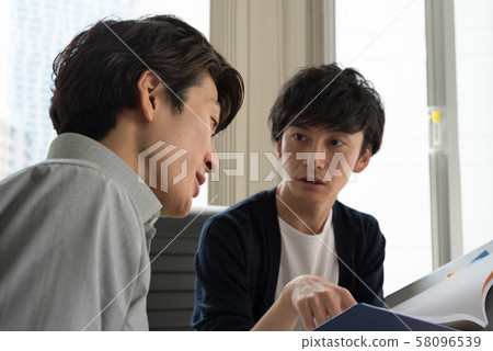 Young employee meeting Young employee meeting 58096539