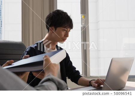 Young employee meeting Young employee meeting 58096541