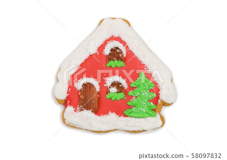 gingerbread cookie snowy house with christmas tree 58097832