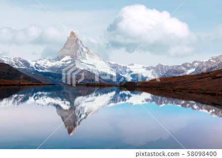 Matterhorn peak with reflection on Stellisee lake 58098400