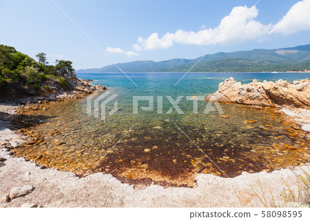Wild beach of  Corsica island at sunny day 58098595