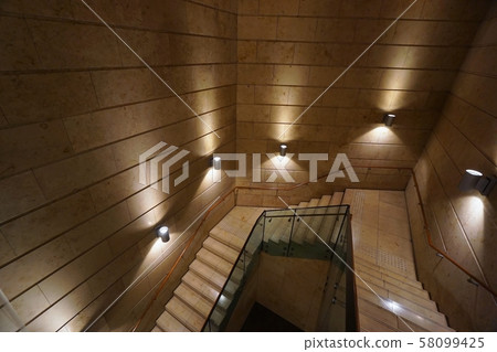 Stairs going down to the basement Stairs going down to the basement 58099425