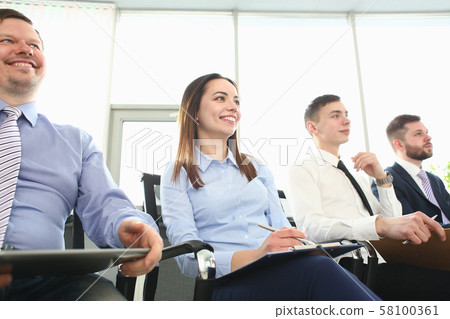 Happy colleagues in office Happy colleagues in office 58100361