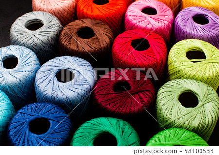 Colored balls of yarn for knitting close up Colored balls of yarn for knitting close up 58100533