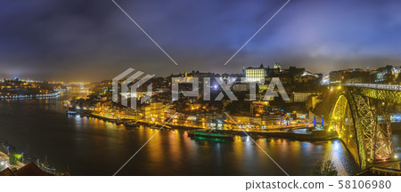 Porto Portugal night panorama city skyline at Porto Ribeira with Douro River and Dom Luis I Bridge Porto Portugal night panorama city skyline at Porto Ribeira with Douro River and Dom Luis I Bridge 58106980