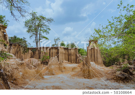 Beautiful Scenery of Water flows through the ground have erosion and collapse of the soil  into a  natural layer at Pong Yub,  Ratchaburi,Thailand Beautiful Scenery of Water flows through the ground have erosion and collapse of the soil  into a  natural layer at Pong Yub,  Ratchaburi,Thailand 58108664