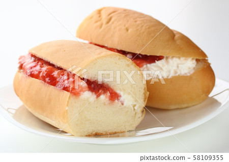 Half cut cream jam bread Half cut cream jam bread 58109355