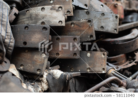 Old engine parts, steel and used car parts, for engineering. Selective focus. 58111040