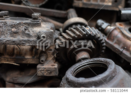 Old engine parts, steel and used car parts, for engineering. Selective focus. Old engine parts, steel and used car parts, for engineering. Selective focus. 58111044