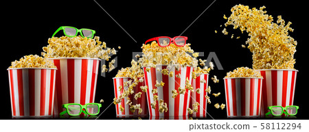Set of buckets with popcorn and 3D glasses isolated on black background 58112294