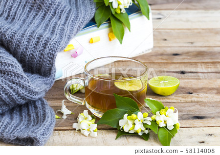 herbal healthy drinks hot lemon tea health care  for cough sore with dictionary book ,knitting wool scarf of lifestyle woman relax in winter herbal healthy drinks hot lemon tea health care  for cough sore with dictionary book ,knitting wool scarf of lifestyle woman relax in winter 58114008