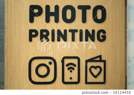 Close-up view of the photo printing sign Close-up view of the photo printing sign 58114458