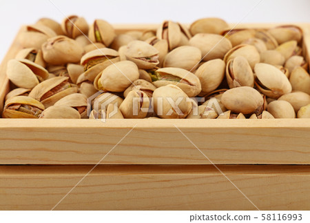 Background of fresh roasted pistachio nuts Background of fresh roasted pistachio nuts 58116993