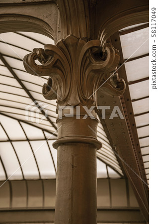 Cast-iron capital in Art Nouveau style and glass ceiling in Brussels Cast-iron capital in Art Nouveau style and glass ceiling in Brussels 58117049