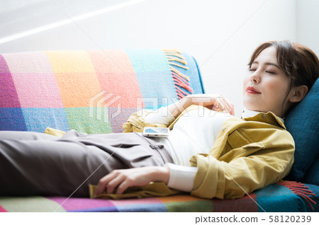 Woman relaxing Woman relaxing 58120239