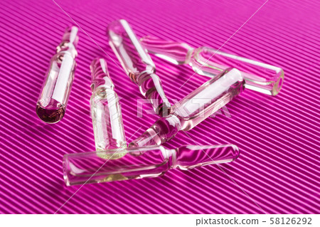 Ampules close up. Medical ampoules. 58126292