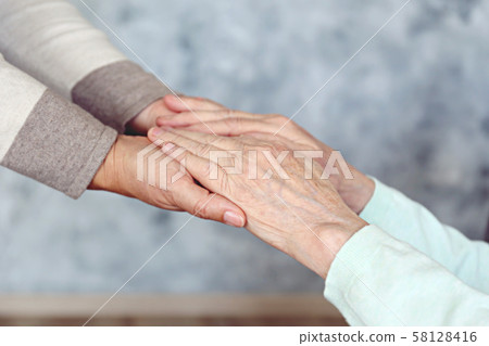 Mature female in elderly care facility gets help Mature female in elderly care facility gets help 58128416
