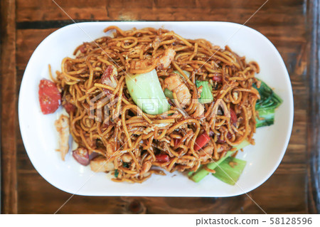 stir-fried noodles with pork, sausage and stir-fried noodles with pork, sausage and 58128596