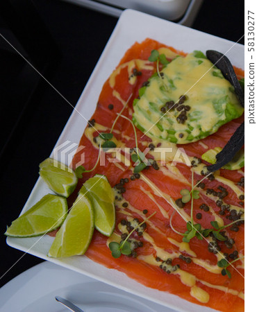 Dried meat prosciutto dish sauce and vegetables Dried meat prosciutto dish sauce and vegetables 58130277
