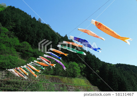 Koinobori swimming in the mountain valley 58131467