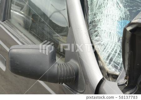 Damaged car body- vehicles accident at road- 58137783