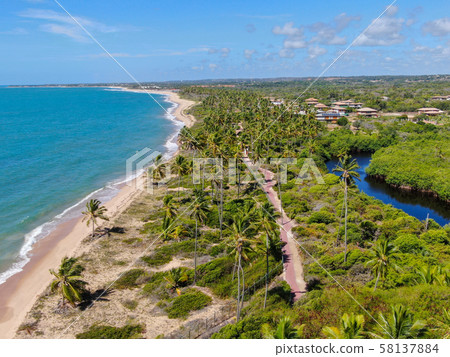 Aerial view of tropical beach and turquoise clear Aerial view of tropical beach and turquoise clear 58137884