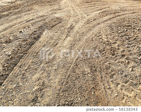 tire track of many vehicle on ground 58138343