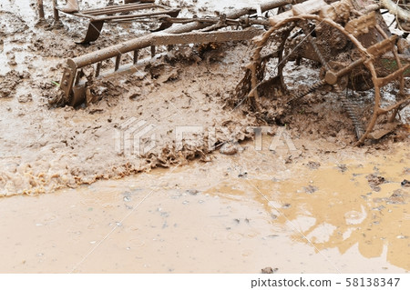 farmer plowing in rice field prepare plant rice 58138347