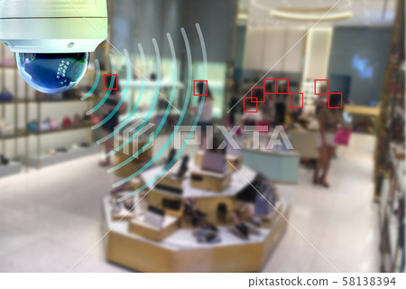 A Speed Dome CCTV  infrared camera  technology 4.0 for look security area of work in shopping mall  show signage with security customers in area. 58138394