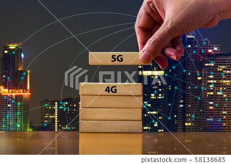 Close up hand picking domino 5G above 4G .That showing developed of best internet connection 5G is network connecting technology future global change from 4G to 5G system concept Close up hand picking domino 5G above 4G .That showing developed of best internet connection 5G is network connecting technology future global change from 4G to 5G system concept 58138685