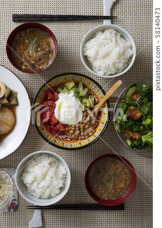 Pork and radish stew and avocado tomato natto table Pork and radish stew and avocado tomato natto table 58140473