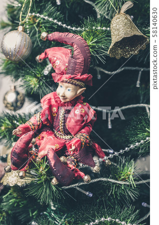 Christmas or New Year decorative toy. Joker Doll Christmas or New Year decorative toy. Joker Doll 58140630