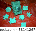 Natural handmade soap. Tank and marine life: crabs, stars, seashells on an orange background.     58141267