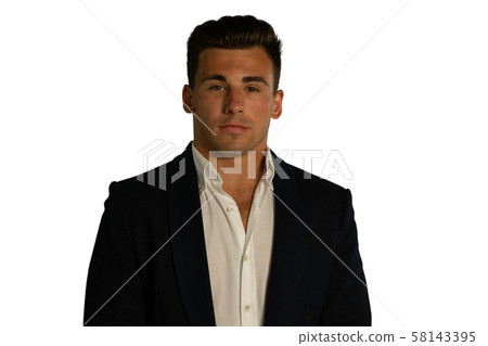 Young businessman looking to camera Young businessman looking to camera 58143395