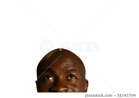 Young man looking up Young man looking up 58143704