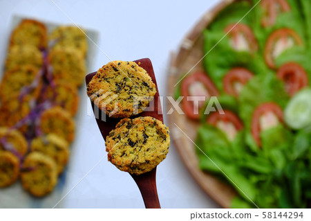 Vietnamese vegan food, green bean pies on salad, savory dish for vegetarian Vietnamese vegan food, green bean pies on salad, savory dish for vegetarian 58144294