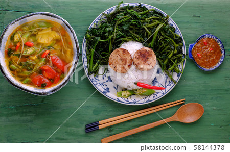 vegetarian meal, rice dish with boiled water morning glory, vegan sausage, sour soup bowl vegetarian meal, rice dish with boiled water morning glory, vegan sausage, sour soup bowl 58144378