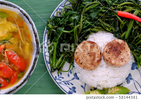 vegetarian meal, rice dish with boiled water morning glory, vegan sausage, sour soup bowl vegetarian meal, rice dish with boiled water morning glory, vegan sausage, sour soup bowl 58144381