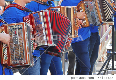 Group of young accordion players Group of young accordion players 58147582