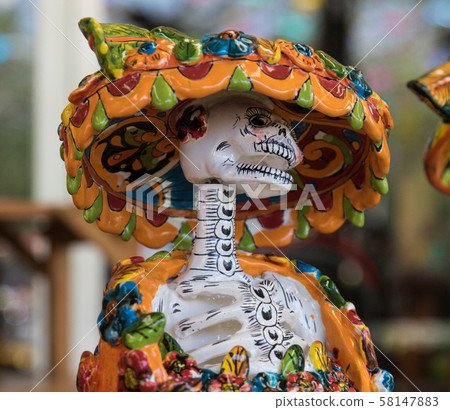 La Calavera Catrina -Mexican colorful traditional souvenirs. The symbol of the holiday of the day of La Calavera Catrina -Mexican colorful traditional souvenirs. The symbol of the holiday of the day of 58147883