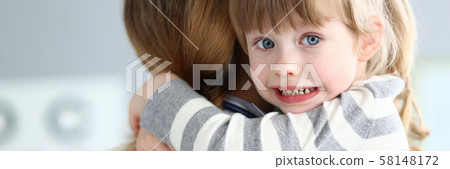 Smiling cute child with doctor Smiling cute child with doctor 58148172