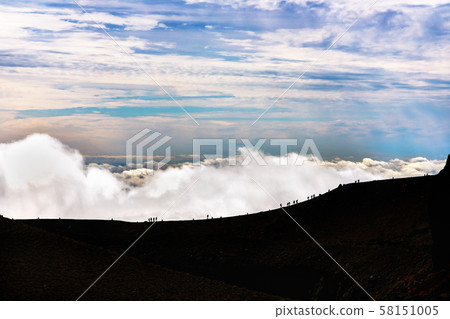 Mountain trail on the clouds 58151005