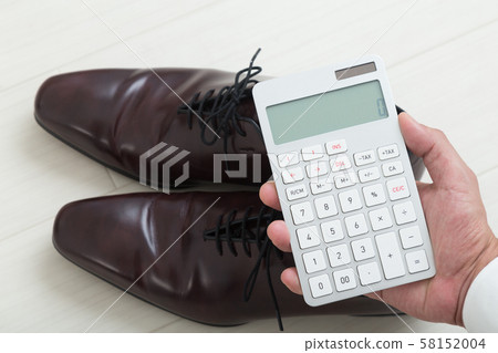 Leather shoes and calculator 58152004