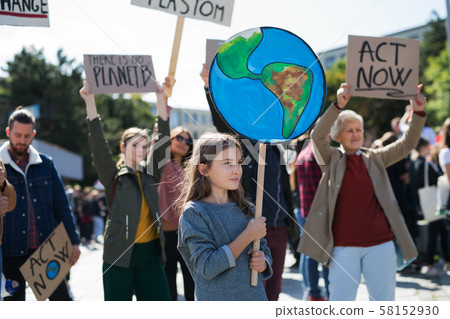 People with placards and posters on global strike for climate change. People with placards and posters on global strike for climate change. 58152930