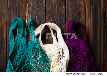 Variety colors of cotton eco mesh bag on the table 58155980