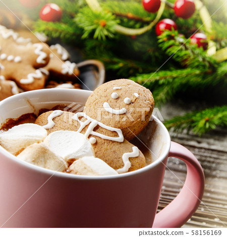 Pink mug with hot chocolate marshmallows and 58156169