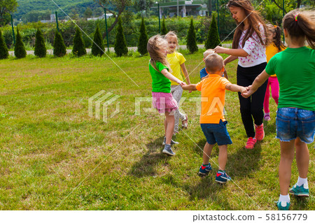 Art camp outdoor, green grass and sunny day Art camp outdoor, green grass and sunny day 58156779