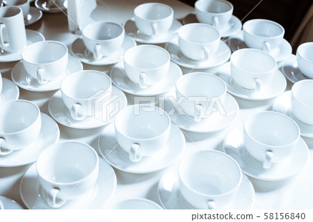 Simple pattern made of empty cups of coffee Simple pattern made of empty cups of coffee 58156840