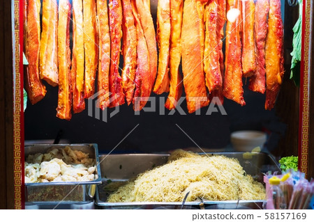 red roast BBQ pork hanging front of Noodle shop red roast BBQ pork hanging front of Noodle shop 58157169