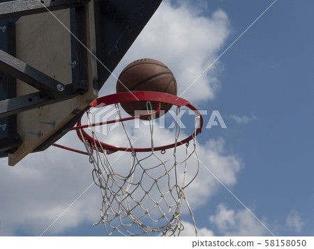 Ring and ball on background of the sky Ring and ball on background of the sky 58158050